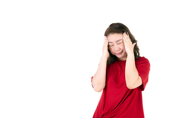 Portrait of middle age 40s Asian woman Middle aged women In a bright red shirt Doing a headache gesture With a painful expression