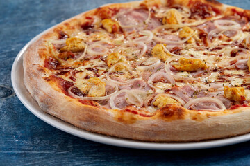 pizza on the wooden background