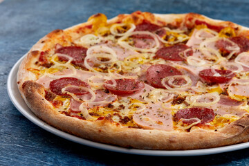 pizza on the wooden background