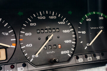 Old car speedometer. Speed indicator background. Parked car zero speed texture. Dashboard of...
