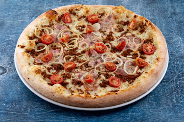 pizza on the wooden background