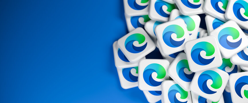 Logos of the Microsoft browser Edge app on a heap. Web banner size with copy space - Selective focus