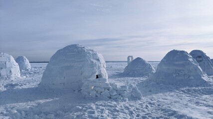 Igloo in a winter mountain setting - Powered by Adobe
