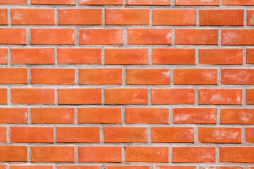 Obraz premium Surface orange brick wall pattern close-up.