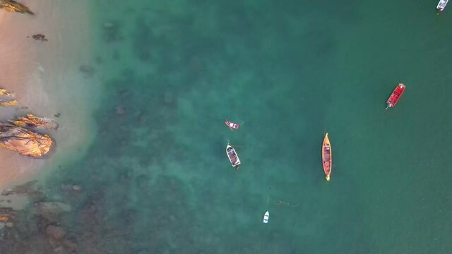 High angle  veiw of rowing boats on sea by drone