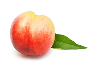 Peach fruit with leaf isolated on white background