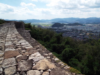 Fototapeta na wymiar Gimhae, South Korea, September 3, 2017: View of the city of Gimhae. South Korea from Bunsanseong Fortress. Three Kingdoms Period. Gimhae. South Korea