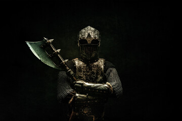 Portrait of a medieval fighter in armor, full face, arms crossed, ax in his hand