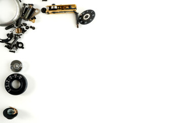 isolated parts with a photo camera on a white background. Repair service concept