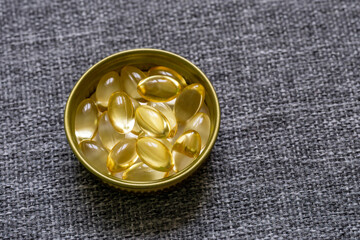 Gelatin capsules in golden metal cork