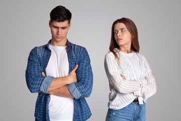 Angry couple ignoring each other, relationship troubles and problems in family