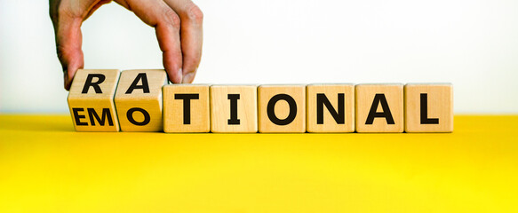 Rational or emotional symbol. Psychologist turns wooden cubes and changed the word 'rational' to...