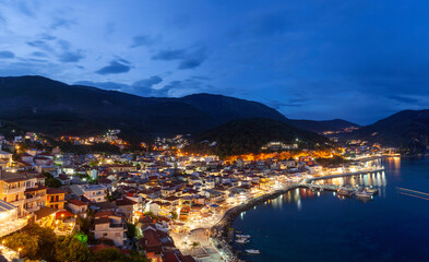 Parga town, panoramic nightscape from the town's castle, during blue hour, in Preveza prefecture, Epirus region, Greece, Europe