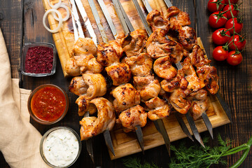 fresh roast chicken shish kebab on cutting board