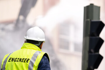 engineer manager in bridge construction site with hardhat inspecting and working