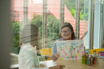 Obraz premium Asian Autism girl playing and learning in special school with young teacher