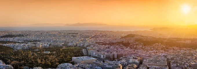 Gordijnen Panoramic view of the urban skyline of Athens, Greece, with all major tourist attractions during sunset time © moofushi