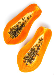 half of ripe papaya fruit with seeds isolated on white background. full depth of field