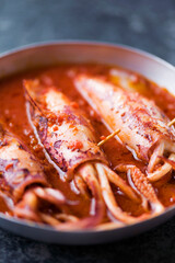 rustic italian stuffed calamari in tomato sauce