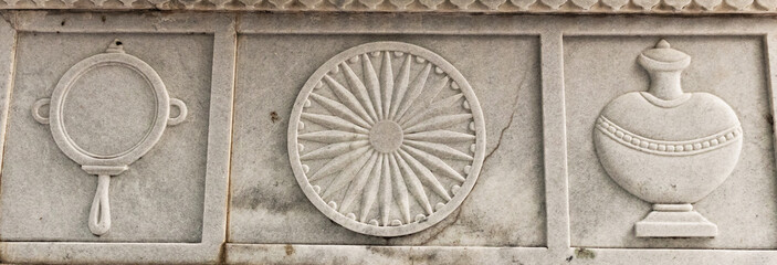 spokes wheel of jainism made of white marble