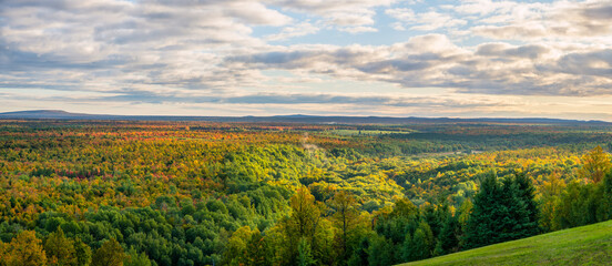 Panoramic autumn view at sunrise from Blackjack Mountain - Big Snow Resort - Michigan Upper Peninsula
