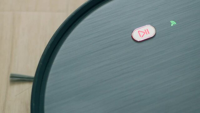Close up of robotic vacuum cleaner battery indicator showing a battery charge
