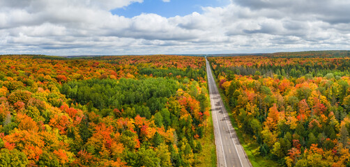 Vibrant autumn colors in the Michigan Upper Peninsula near Ironwood -  scenic drive on US Highway 2,