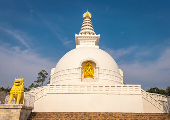 buddhist stupa isolated with amazing blue sky from unique perspective