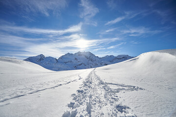 Fototapeta na wymiar Ski touring track on the Swiss Alps