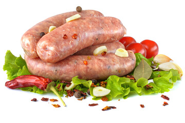 Raw pork sausages. Grilled sausages, spices close-up, isolated on a white background.Selective focus.