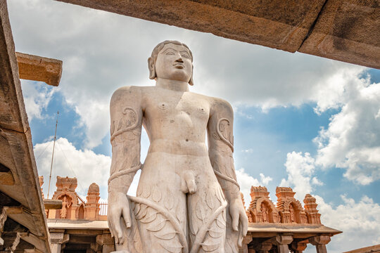 idol of a deity stone statue symbolizing Peace in Jainism with blue sky from different angles