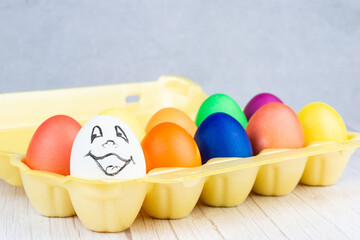 Easter eggs on a wooden white background