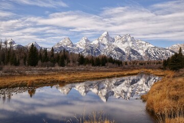 reflection of beautiful landscape view of Grand Teton mountain at Schwabacher Landing Moose in Grand Teton National Park which is located in Wyoming State, USA