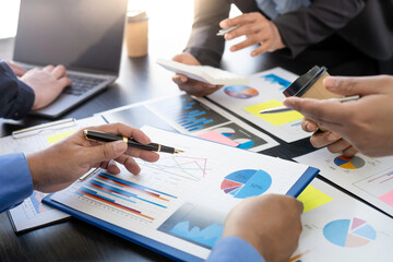 Meeting concept Business team hands at working with financial plan, meeting, discussion, brainstorm with tablet on the office desk,