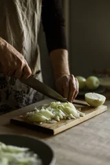 Foto op Canvas Male hands cutting onions © Daria