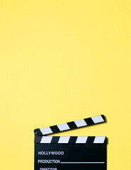 
Movie clapperboard on yellow background
Conceptual of cinema
