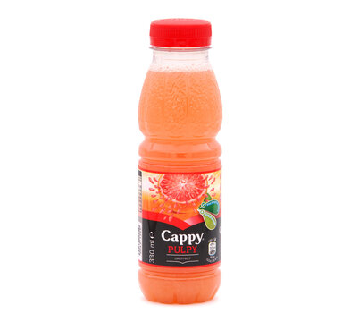 BUCHAREST, ROMANIA - JANUARY 16, 2020. Bottle of Cappy Pulpy Grapefruit fruit juice isolated on white 