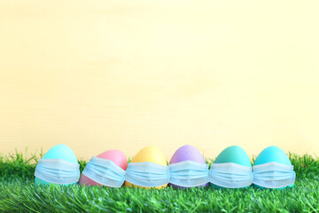 Cute bunny with medical mask. Top view, Flat lay. Coronavirus prevention concept