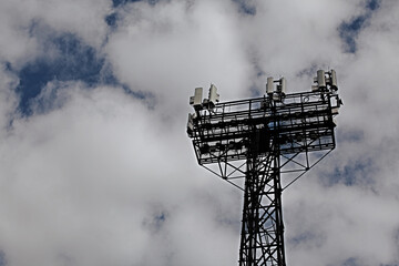 Cell Tower on the Background of A Cloudy Sky. GPS Concept, Communication Technology, LTE, 5G