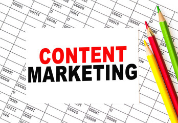 Text CONTENT MARKETING on financial tables, the working paper . Business and financial conzept.