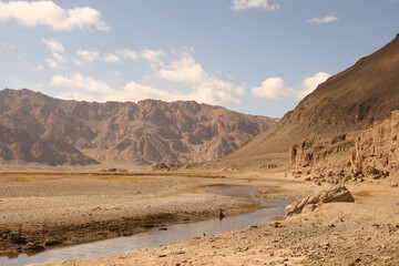 Stunning high-altitude mountain landscape along the Pamir Highway close to Kyzyl Art border in the high mountains of Gorno-Badakshan, Murghab district, Tajikistan. Photo with copy space