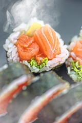 smoked salmon in sushi served in a restaurant