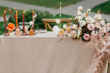 Boho style, wedding table decor, beautiful festive, table set up for marriage party © Prostock-studio
