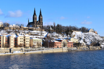 Prague Czech Republic snowy Vysehrad and Vltava river stock images. Winter in Prague city stock...