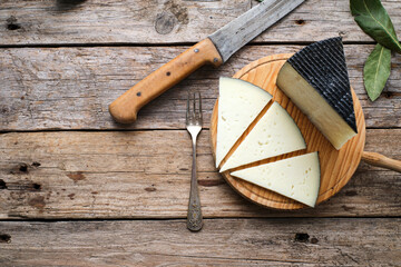 Spanish cured cheese with rustic background - obrazy, fototapety, plakaty
