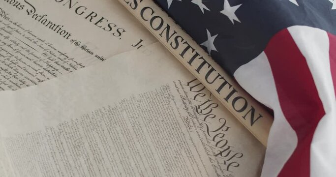 US constitution and US flag