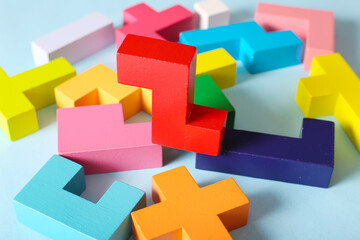 Multicolored puzzle, cubes on a blue background