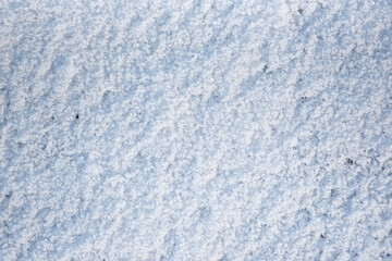 .Texture of various shapes and formations of snow on the ice.