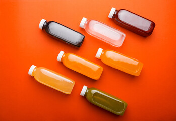 Photo of healthy detox juices over red background, healthy lifestyle, best thing in morning.