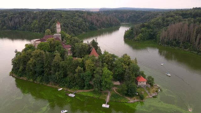 Aerial view on czech medieval castle Zvikov, situated on rocky outcrop above the confluence of two rivers Vltava and Otava in Czech republic